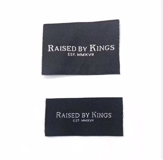 Prix ​​d'usine fer personnalisé sur vêtement étiquette tissée par transfert de chaleur étiquette de soin pour vêtements