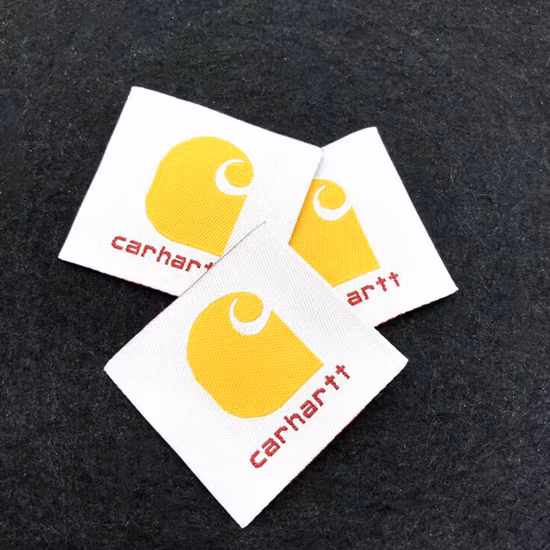 Étiquette tissée colorée de vêtements d'usine de haute qualité personnalisée en gros de Guangzhou